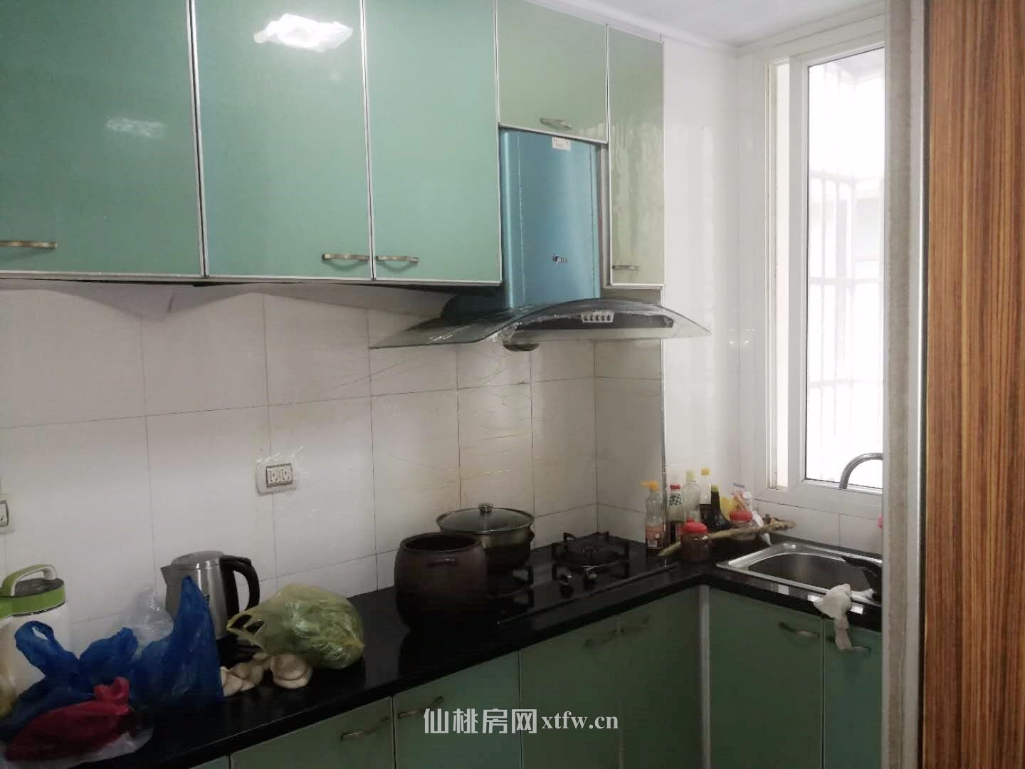 爱民路吴刚酒店旁